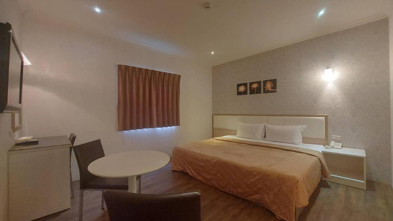 Jungle City Motel Chiayi Buitenkant foto