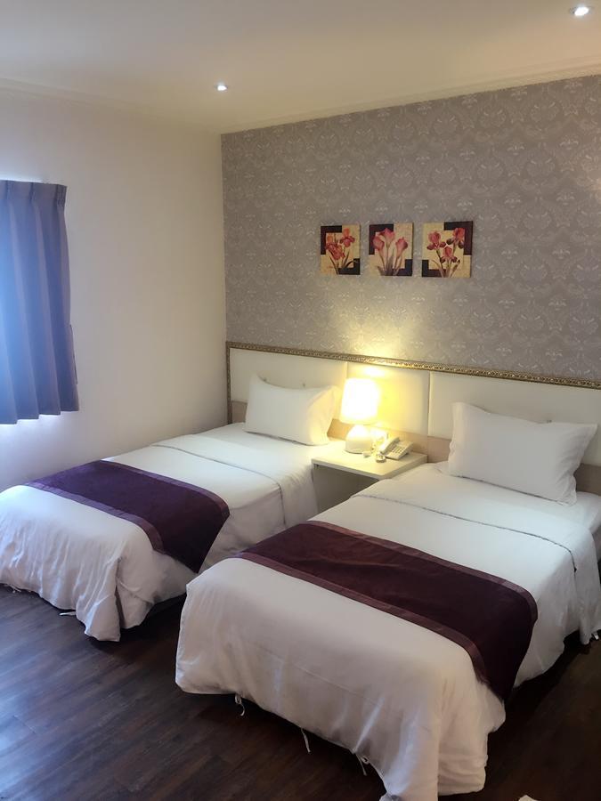 Jungle City Motel Chiayi Buitenkant foto